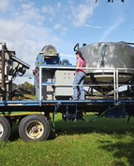 ARS support scientist, Sarah Fishel adjusting the centrifuge speed of the MAPHEX system